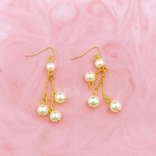 Boucles d'oreilles artisanales en perles et or