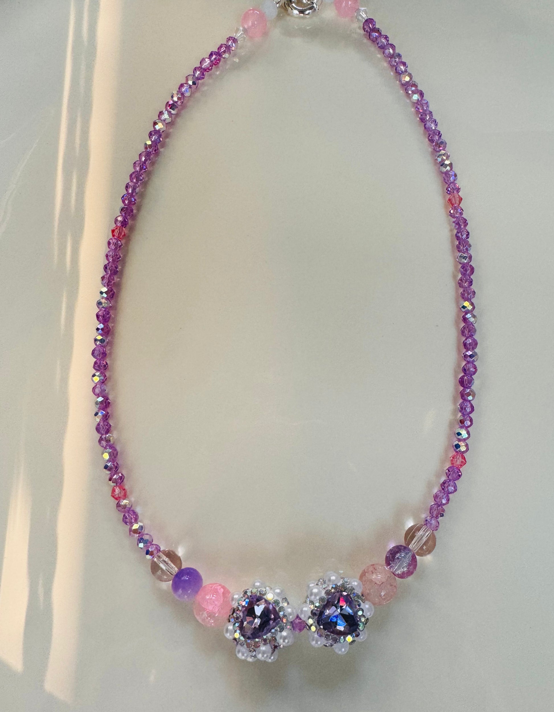 Necklace with purple crystals 