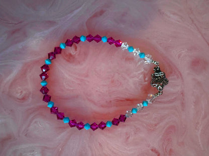 ホットピンクのフシアとペールブルーのクリスタルブレスレット、ヨーロピアンビーズ付き